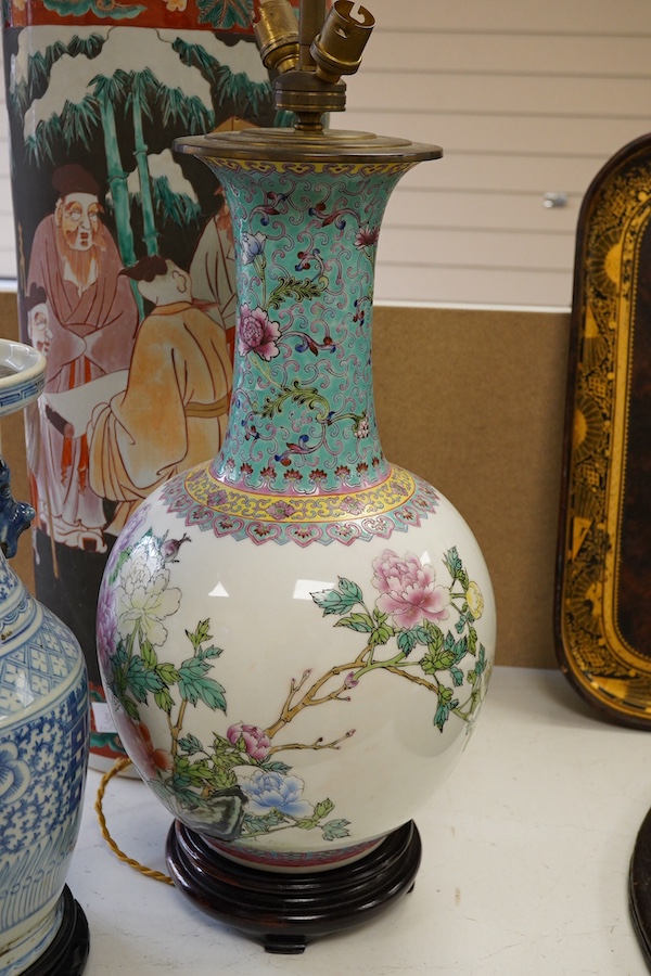 Two Chinese porcelain vases converted to lamps, together with a stick stand (repaired), largest 78cm high overall. Condition - lamps fair to good